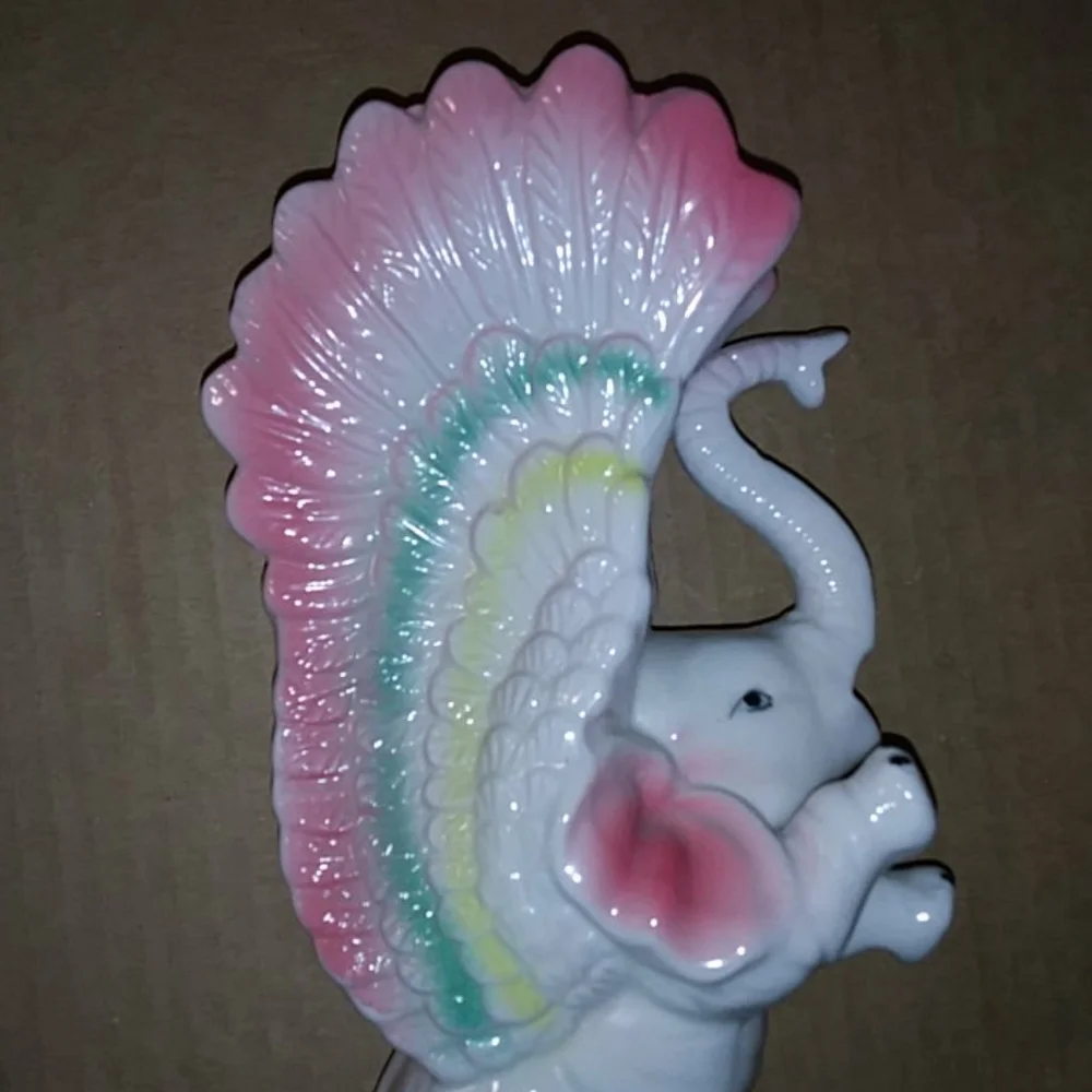 Vintage vase elephant with wings